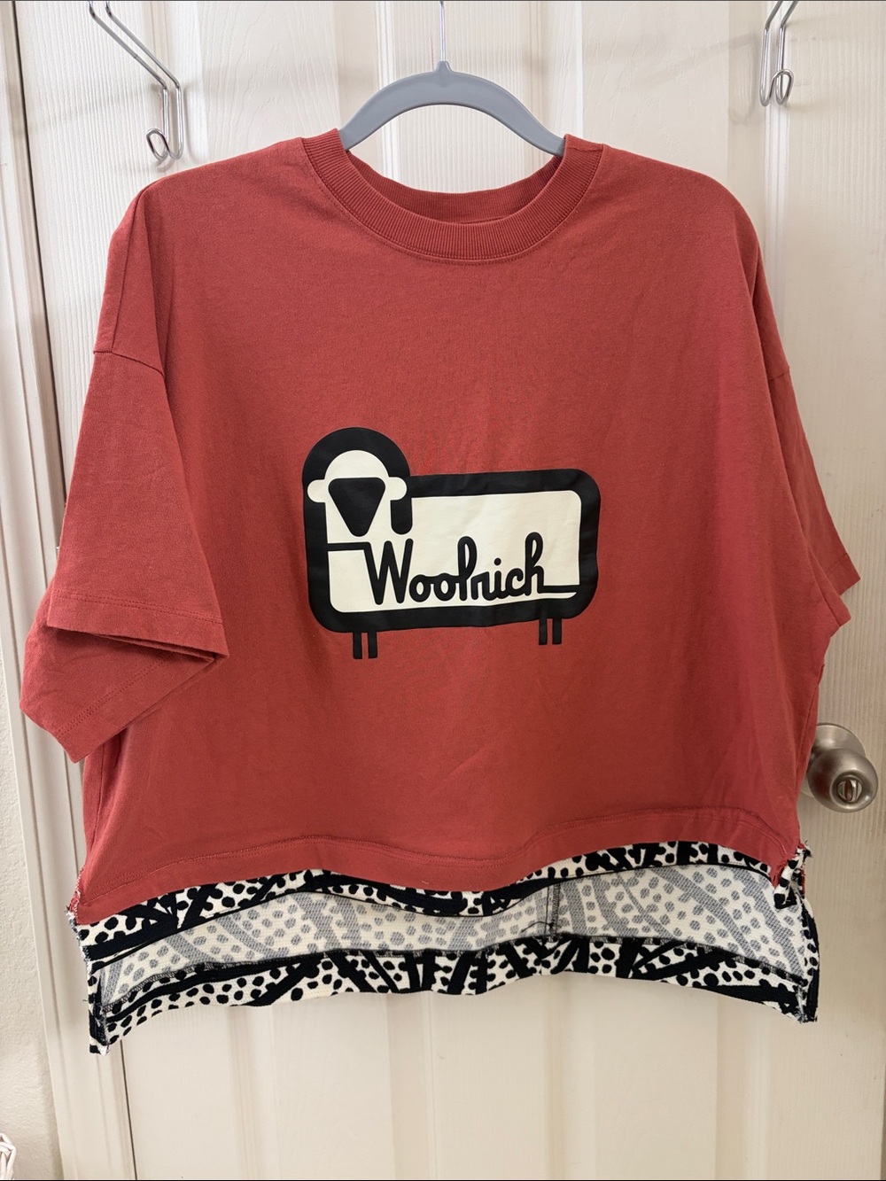 Woolrich Cropped Logo Tee in Brick Red with Black and Cream Graphic